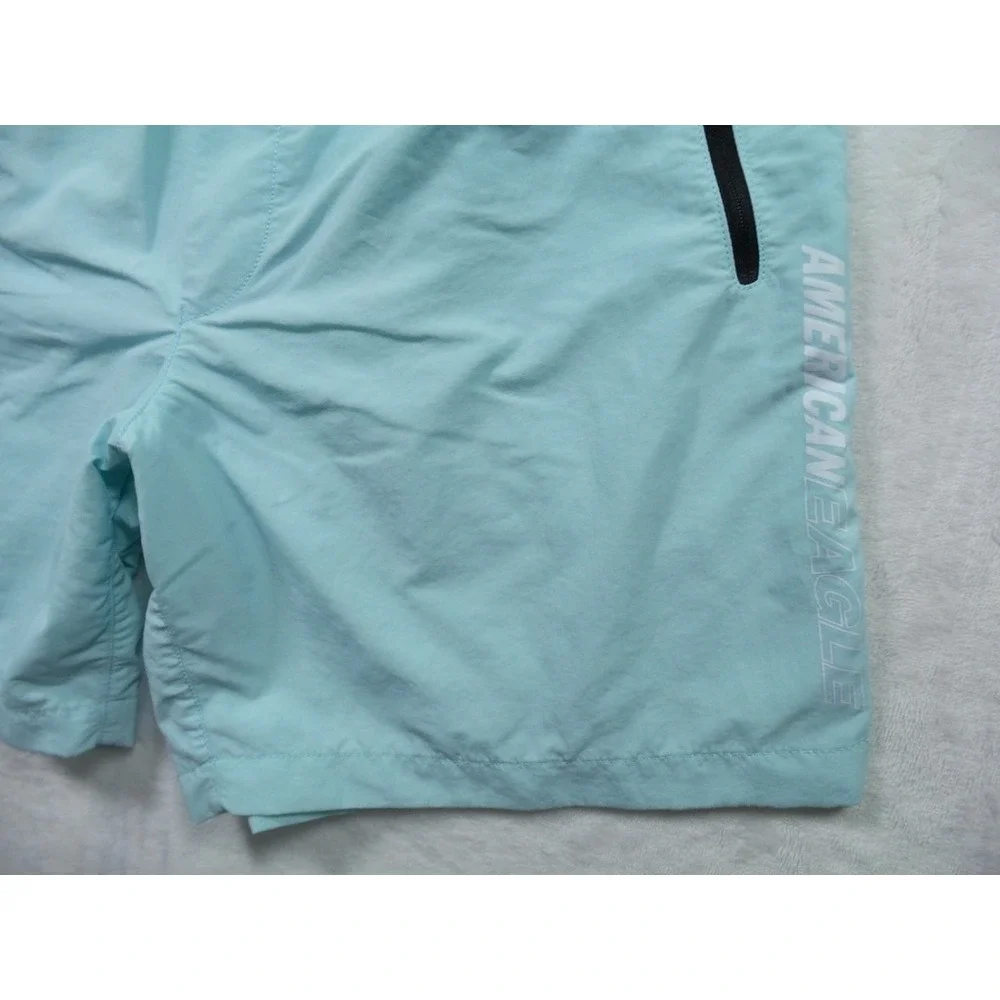 American Eagle Shorts Mens Large Blue Swim Trunks Zip Pockets Drawstring Stretch